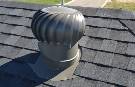 A turbine vent on a pitched roof
