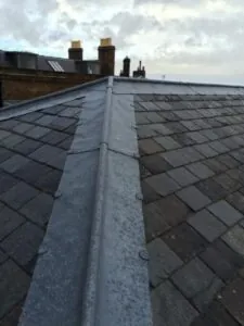 Lead ridge flashing.