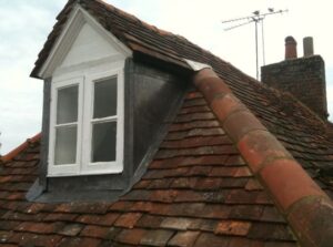 Lead flashing on dormer.